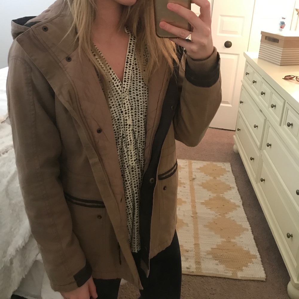Tan thread and supply coat